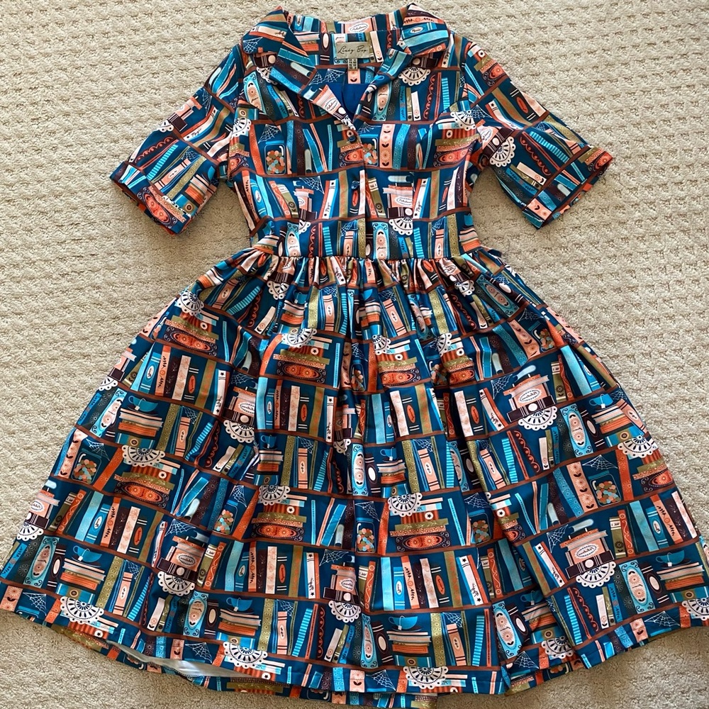 Lindy Bop Bletchley Book Print Turquoise Swing Dress